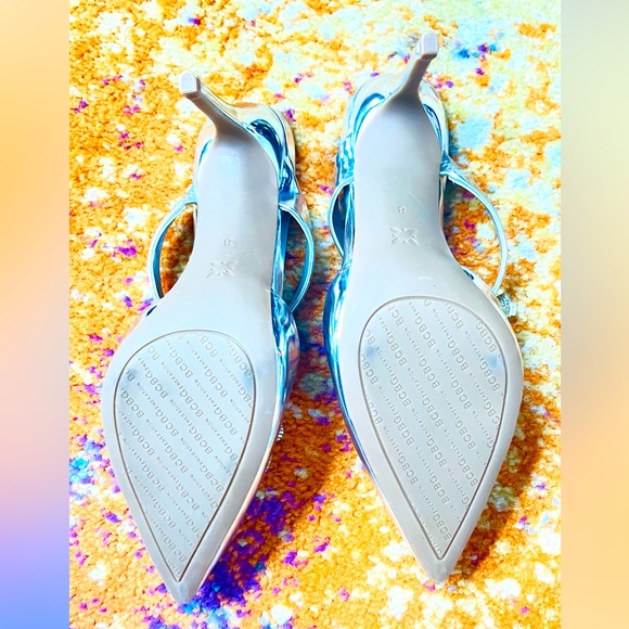 New BCBGeneration
Bardia Metallic Patent Rhinestone Bows Dress Mules - Picture 12 of 13